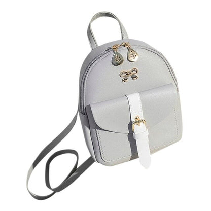 Mini mochila para mujer, bolso de hombro con lazo encantador de cuero PU